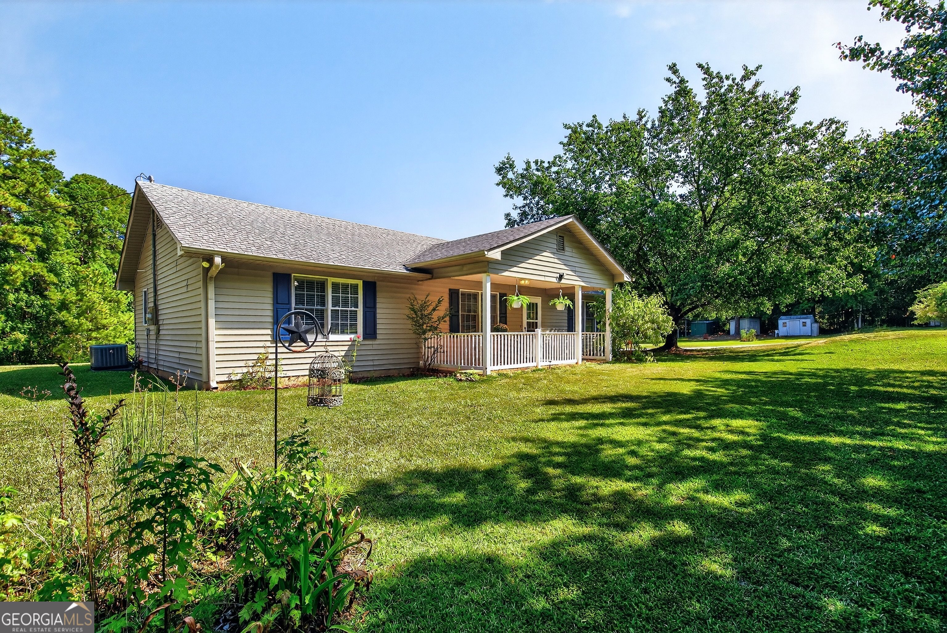 466 Minter Drive Hampton, GA 30228 - Photo 39 of 81 a front view of house with yard and green space