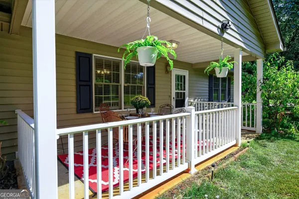 a backyard of a house with seating space