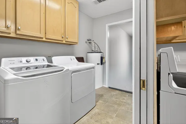 a view of a lake with a house