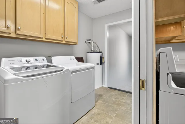 a view of a lake with a house