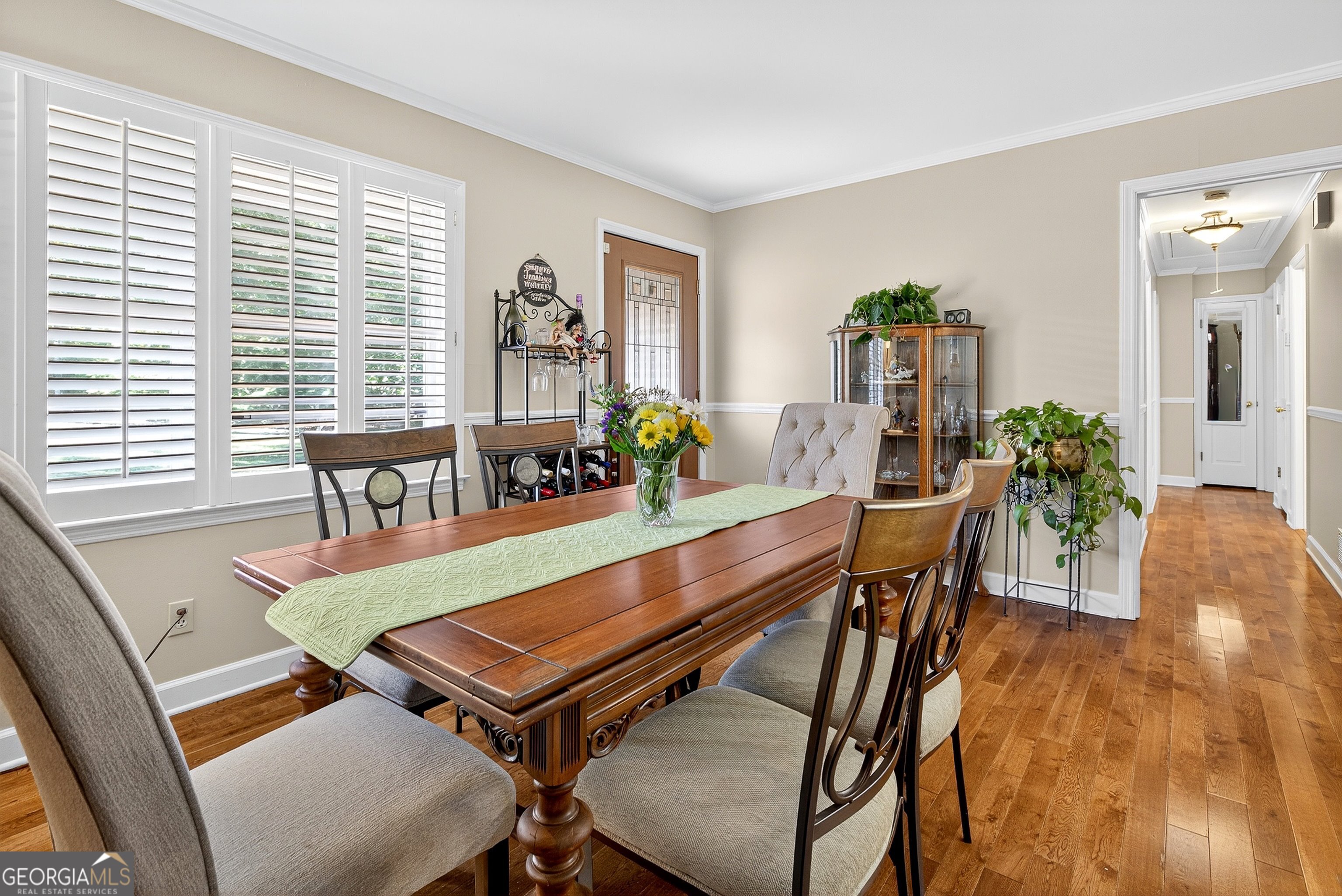 466 Minter Drive Hampton, GA 30228 - Photo 6 of 81 a living room with furniture a table and a large window
