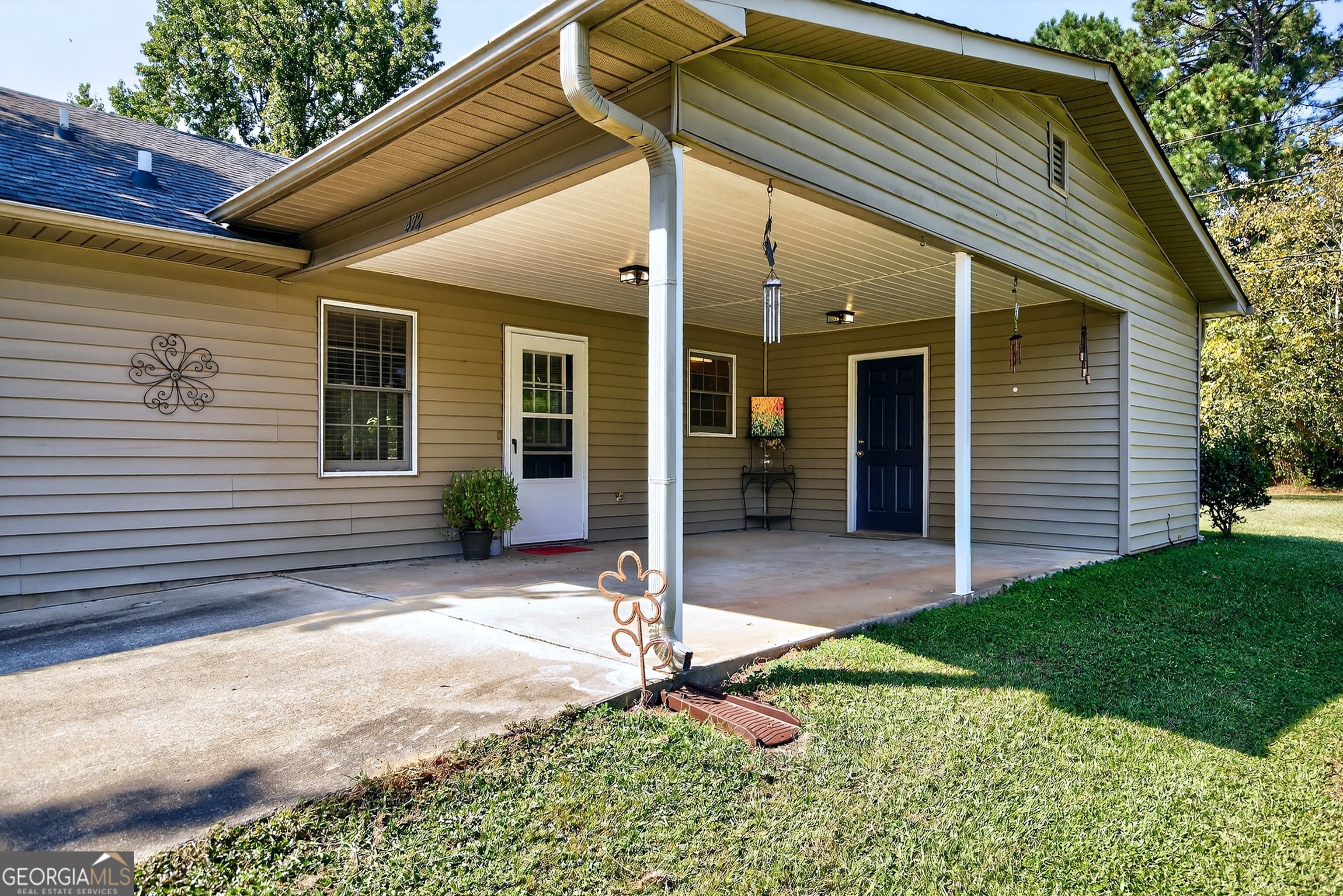 466 Minter Drive Hampton, GA 30228 - Photo 61 of 81 a backyard of a house with seating space