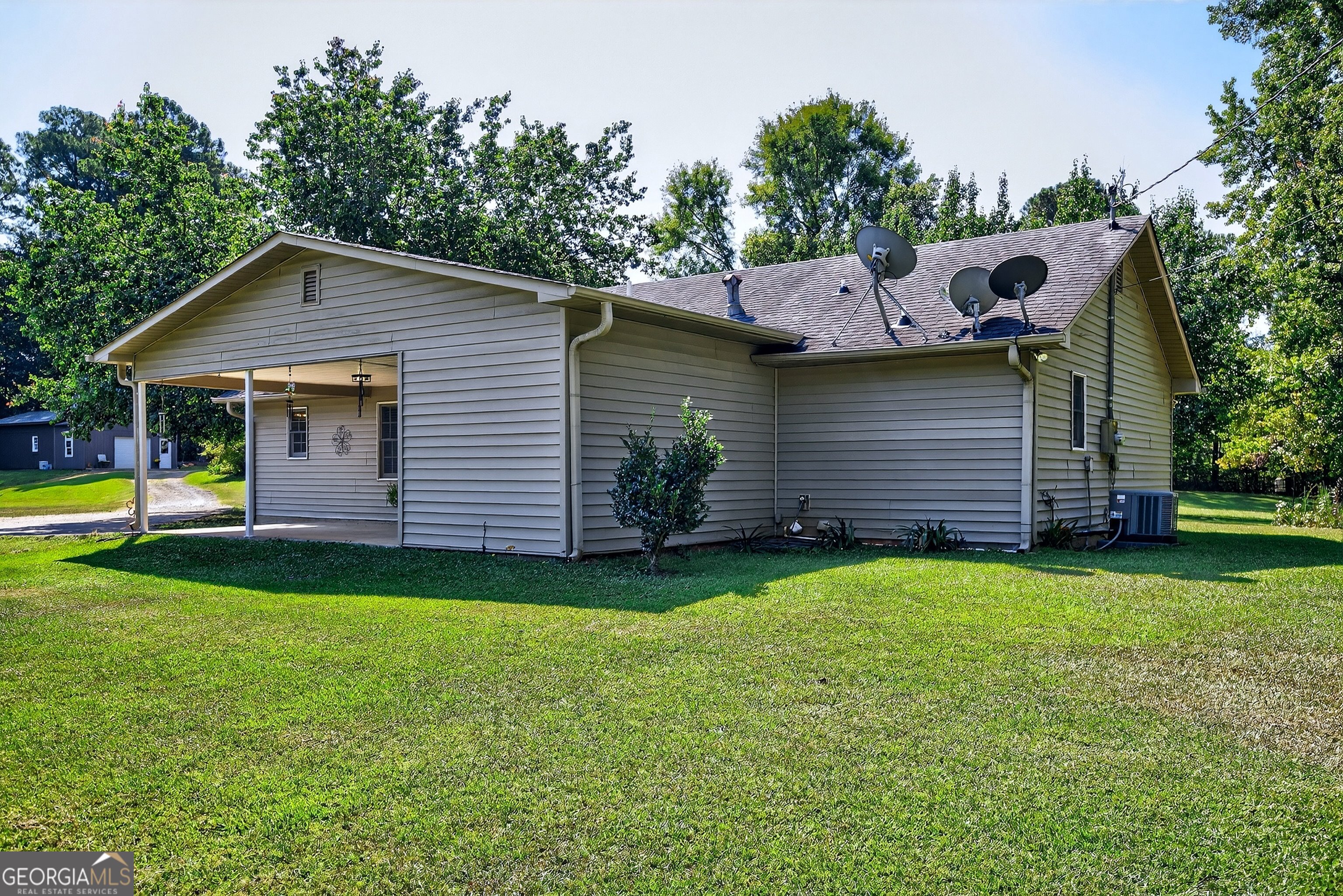 466 Minter Drive Hampton, GA 30228 - Photo 63 of 81 a backyard of a house with lots of green space