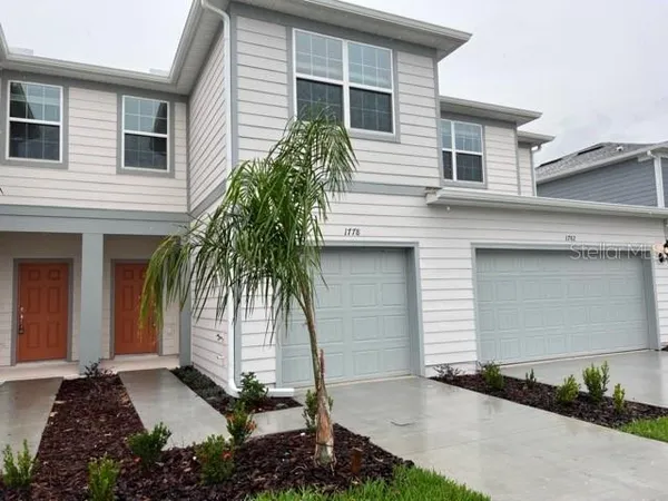a front view of house with yard