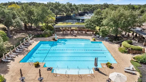 a view of a yard with an outdoor seating