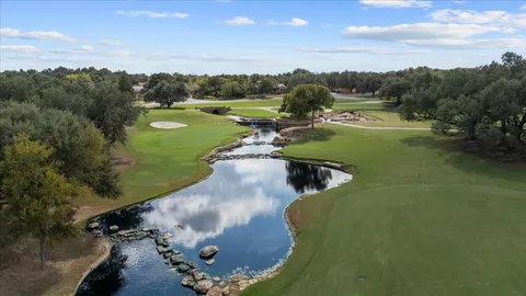 a view of a garden with trees