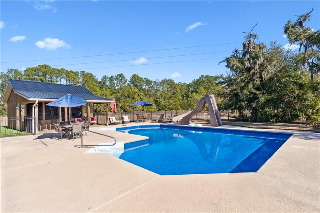 210 Sandpiper Road Brunswick, GA 31523 - Photo 47 of 54 Pool liner replaced May 2024
