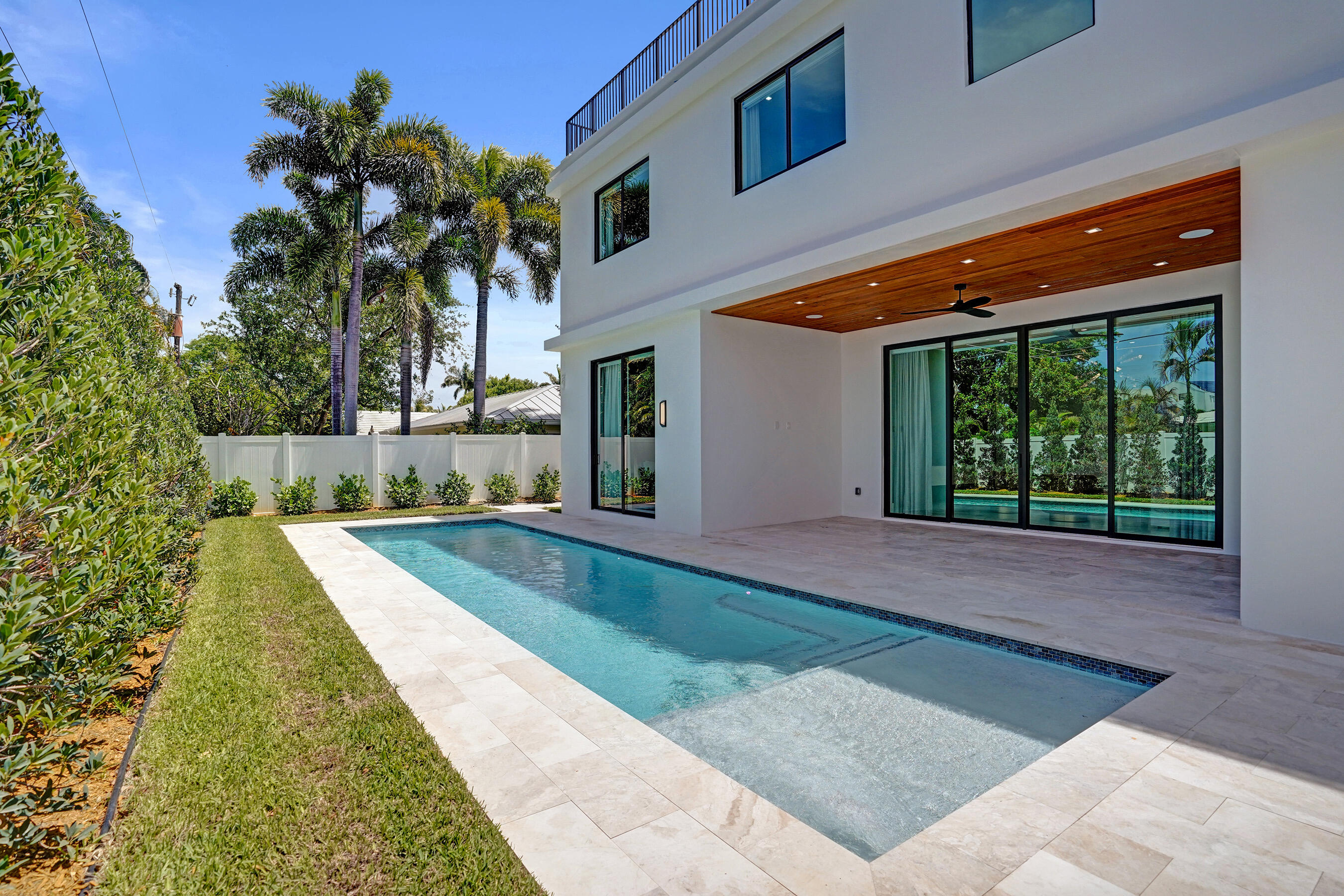 365 Northeast 3rd Street Boca Raton, FL 33432 - Photo 38 of 41 a view of backyard with swimming pool and outdoor seating