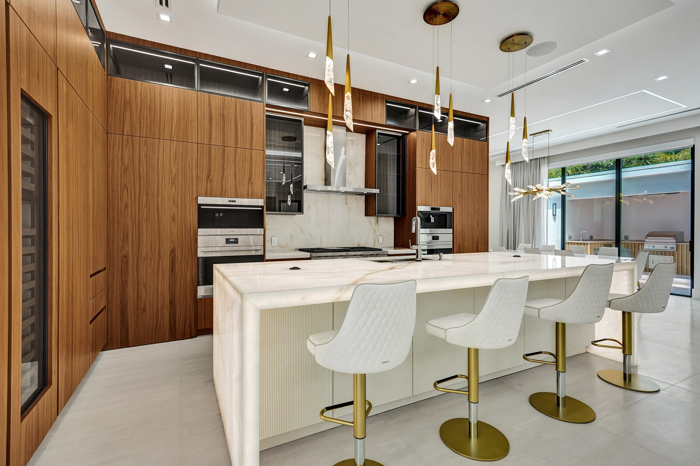 365 Northeast 3rd Street Boca Raton, FL 33432 - Photo 5 of 41 a kitchen with a table and chairs in it