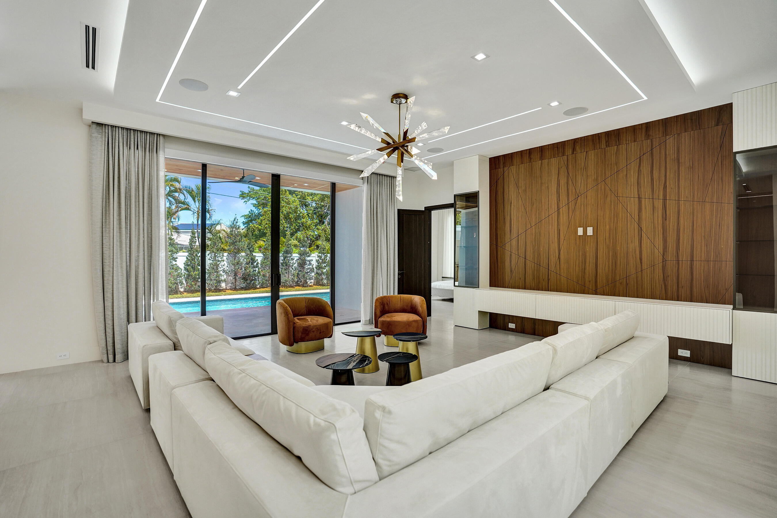 365 Northeast 3rd Street Boca Raton, FL 33432 - Photo 8 of 41 a living room with furniture and large windows