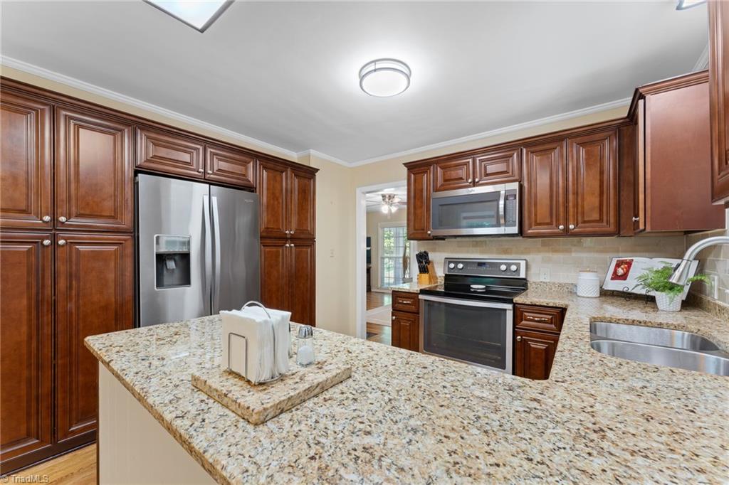 1053 Cantering Road High Point, NC 27262 - Photo 21 of 46 Lovely updated counters and SS appliances