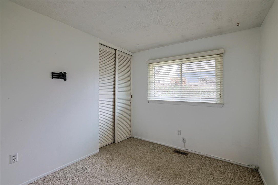 4307 Meadowcroft Road Dayton, OH 45429 - Photo 20 of 26 This cozy bedroom offers a tranquil retreat with ample natural light.