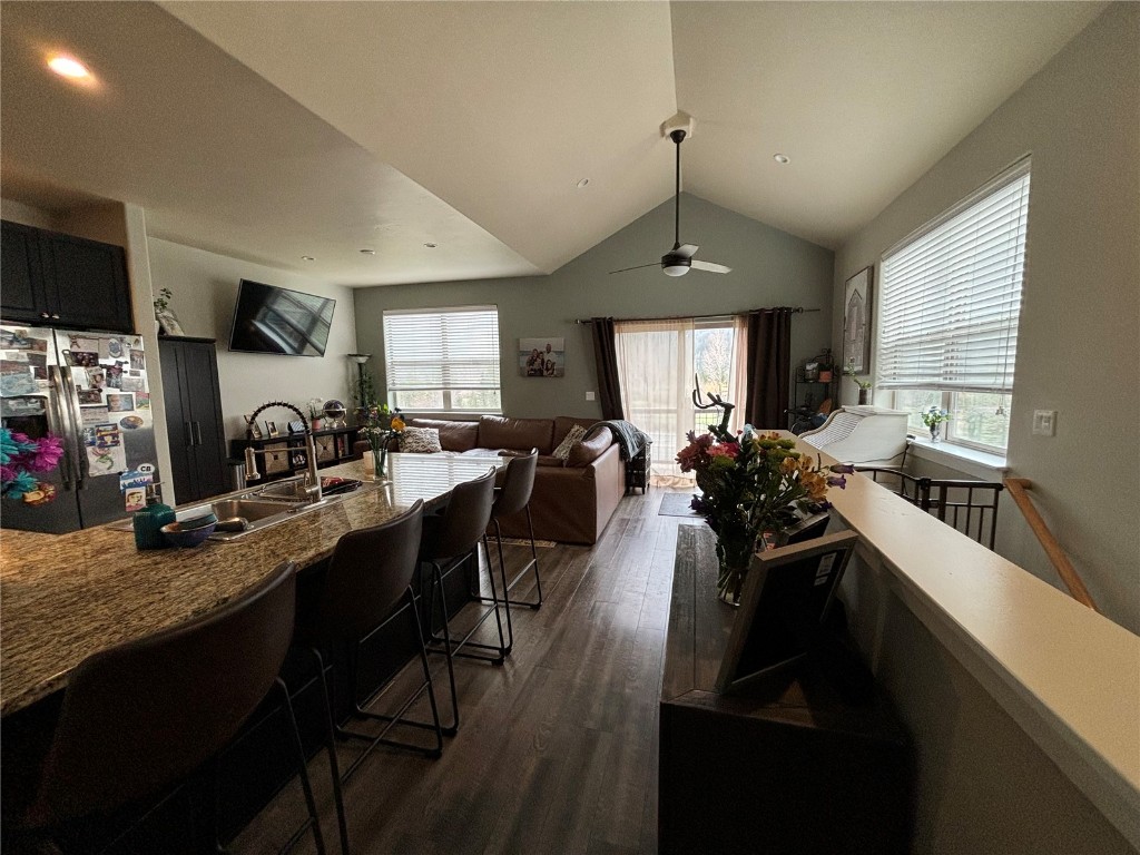 43 Wayback Drive Dillon, CO 80435 - Photo 11 of 17 a very nice looking dining room with a large window kitchen island granite countertop a sink a table and chairs