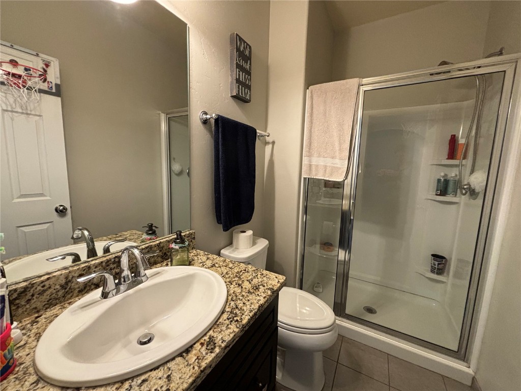 43 Wayback Drive Dillon, CO 80435 - Photo 13 of 17 a bathroom with a sink toilet and shower