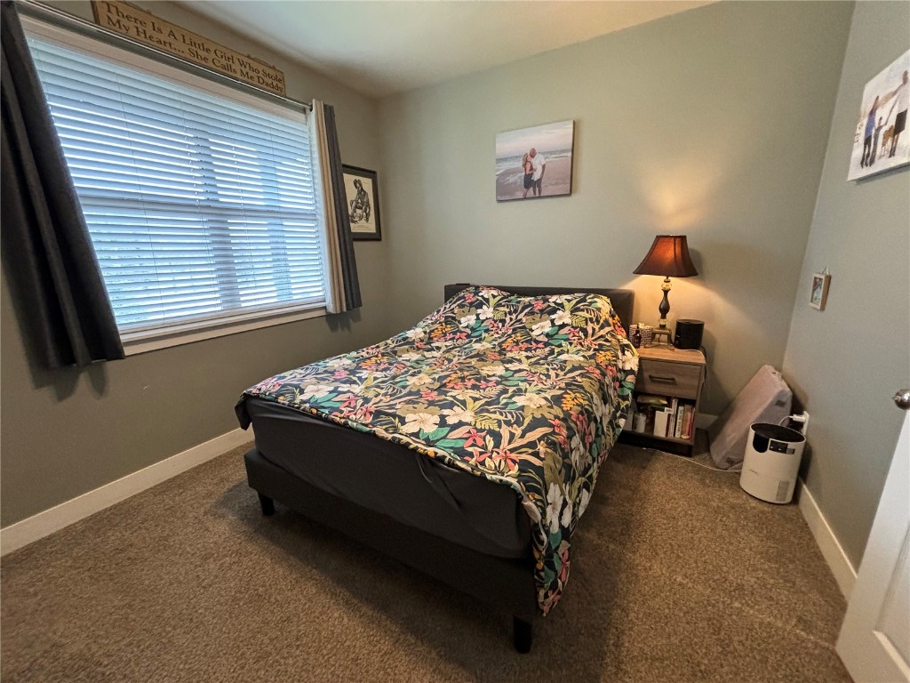 43 Wayback Drive Dillon, CO 80435 - Photo 4 of 17 a bed sitting in a bedroom next to a window