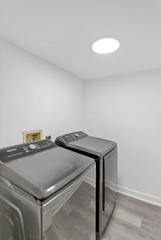 a utility room with washer and dryer
