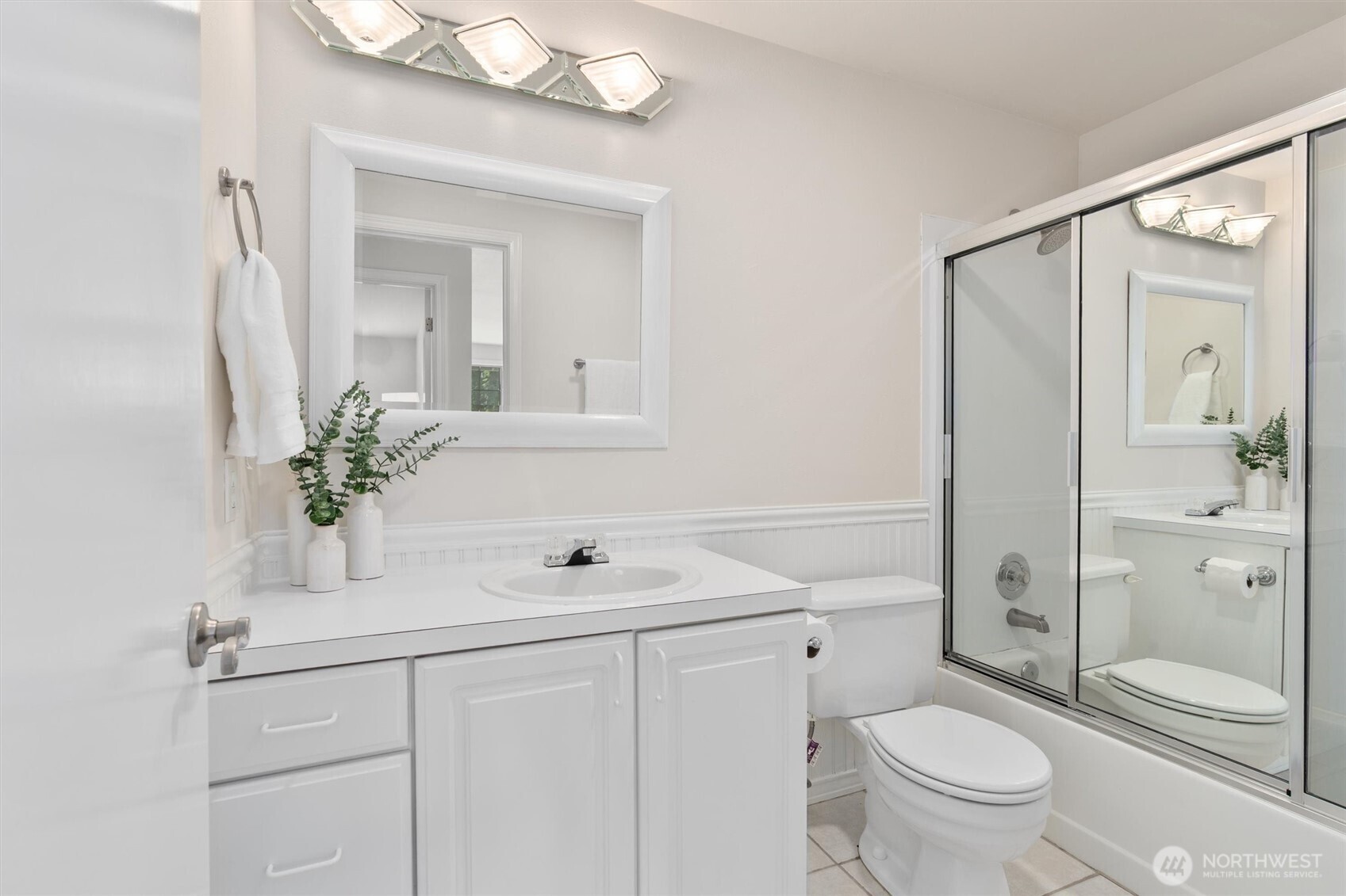 2101 233rd Street Southeast Bothell, WA 98021 - Photo 22 of 40 a bathroom with a sink a toilet and shower