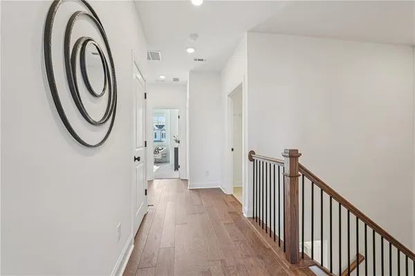 a bathroom with a sink a vanity and a mirror