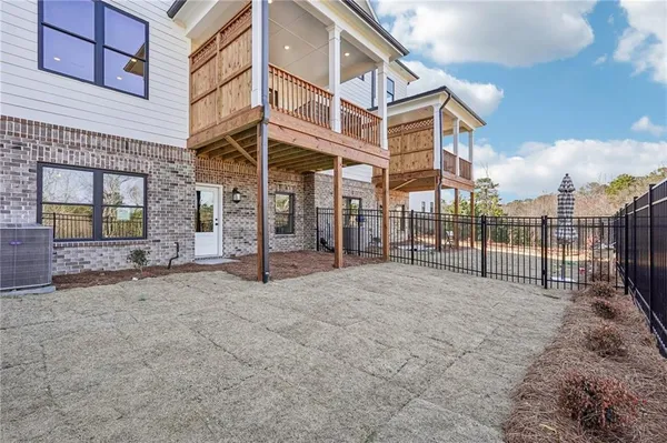 a view of a house with sitting area and furniture