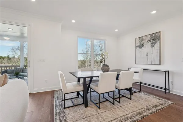 a view of a dining room with furniture