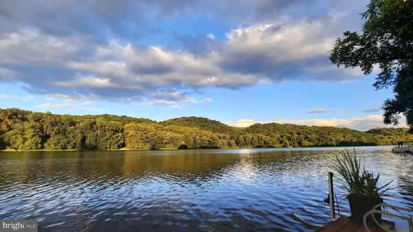 a view of lake with mountain