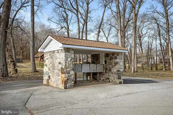a view of a lake with mountains in the background