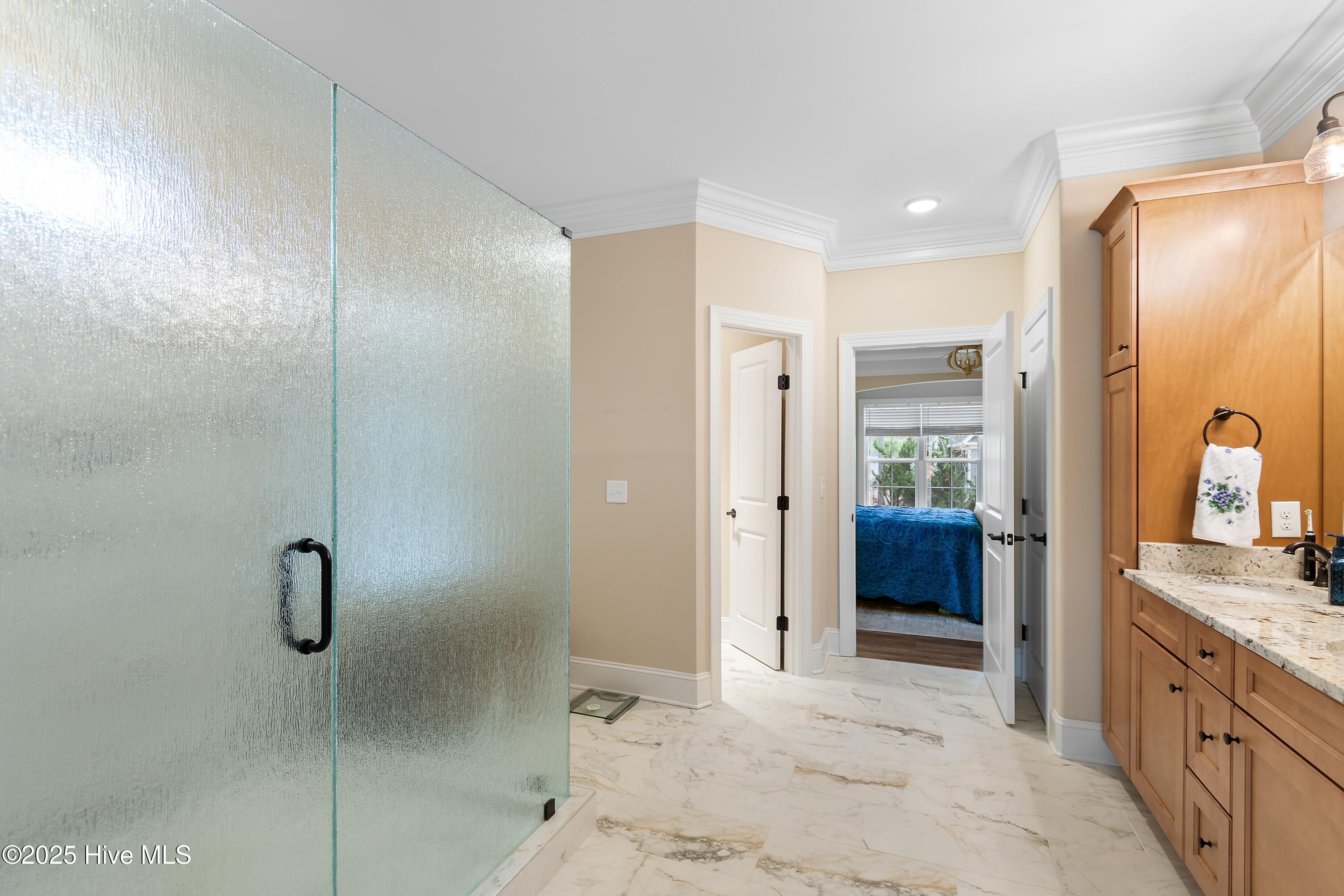 6482 Kirkwall Point Southwest Ocean Isle Beach, NC 28469 - Photo 27 of 87 Primary bathroom