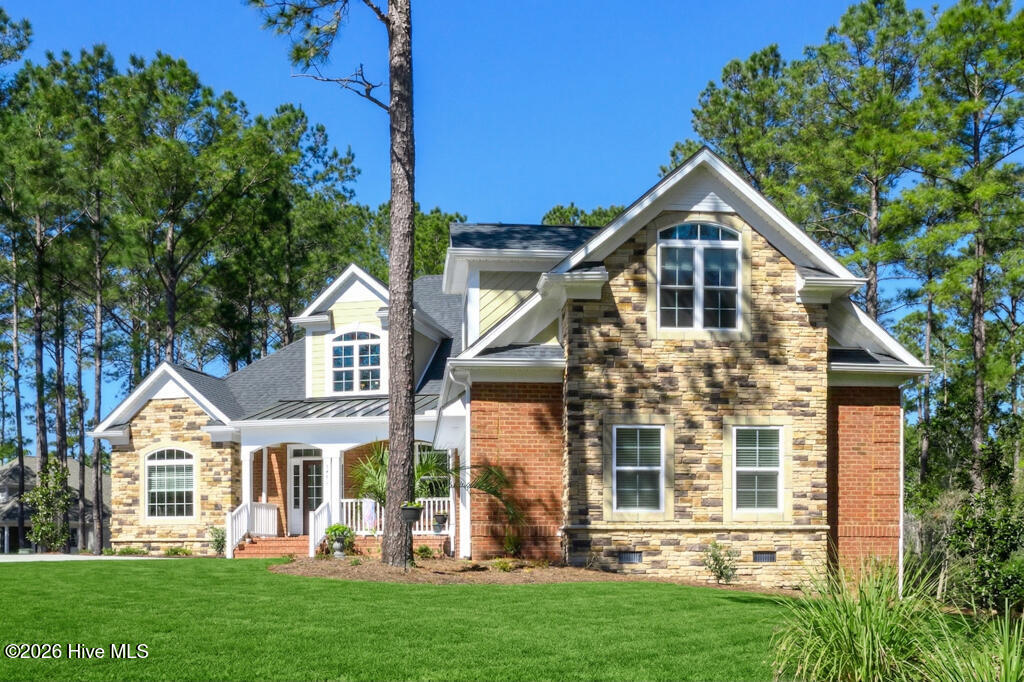 6482 Kirkwall Point Southwest Ocean Isle Beach, NC 28469 - Photo 3 of 87 Front of home with AI Grass.