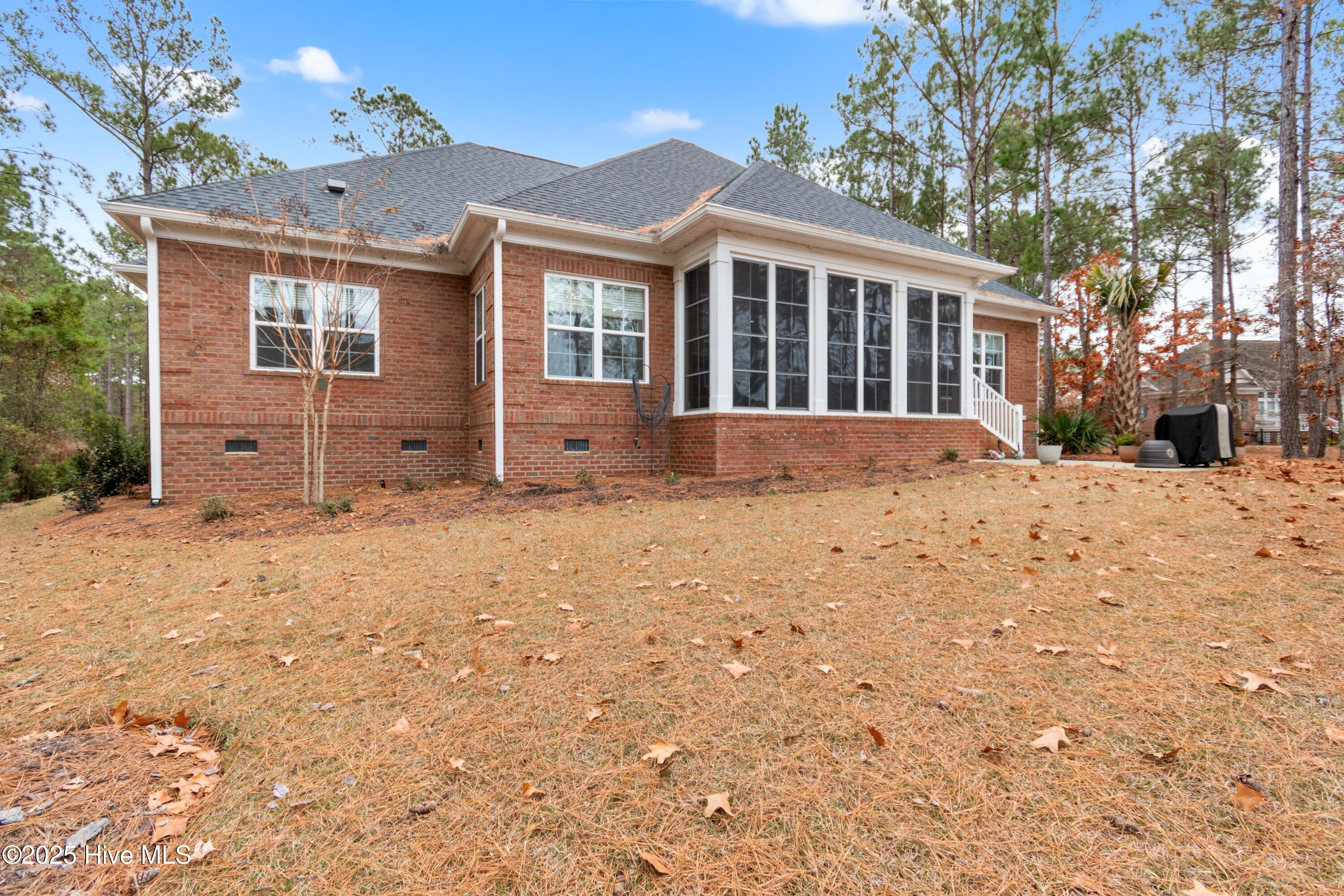 6482 Kirkwall Point Southwest Ocean Isle Beach, NC 28469 - Photo 55 of 91 Rear of home