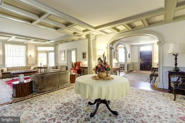 a view of a dining room with furniture and window