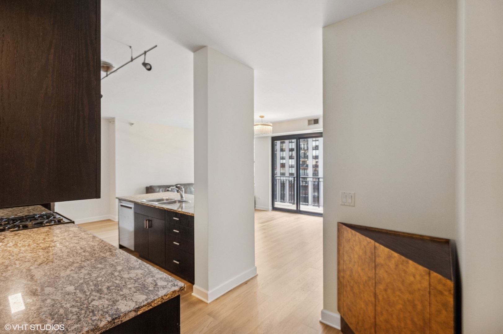 451 West Huron Street, Unit 910 Chicago, IL 60654 - Photo 16 of 27 view of living room with furniture and window