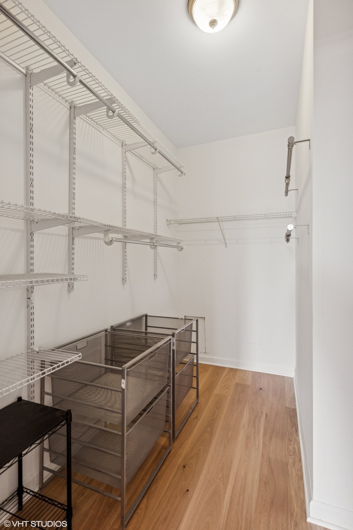 451 West Huron Street, Unit 910 Chicago, IL 60654 - Photo 25 of 27 a room with a table and a window