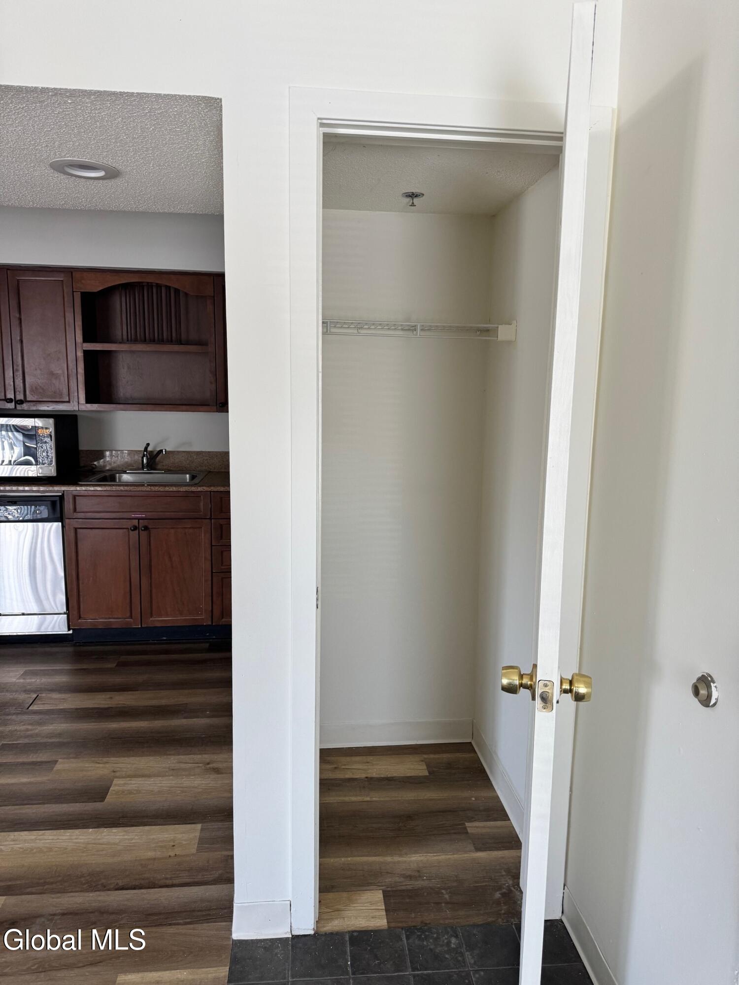 14 Residence Inn Drive, Unit 201 Colonie, NY 12110 - Photo 3 of 9 Entry closet
