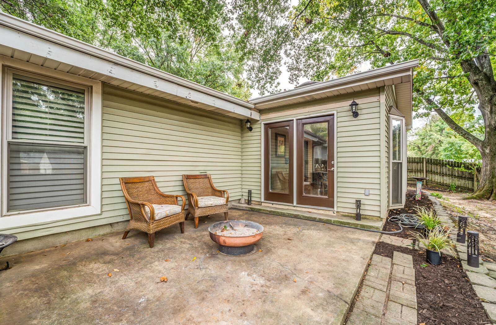 3089 Charles Bryan Road Bartlett, TN 38134 - Photo 26 of 28 a view of backyard with outdoor seating and plants