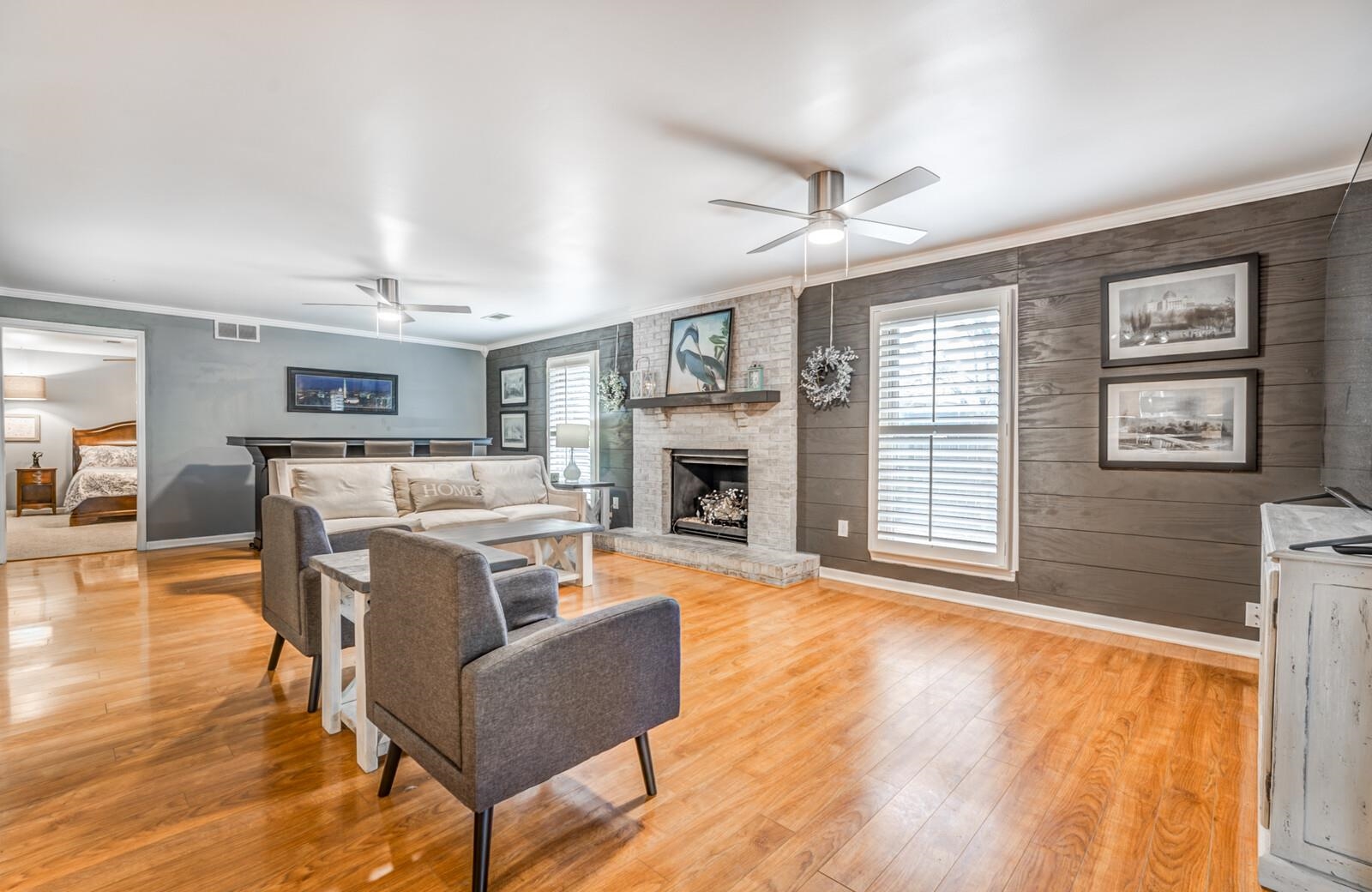 3089 Charles Bryan Road Bartlett, TN 38134 - Photo 5 of 28 a living room with furniture and a fireplace