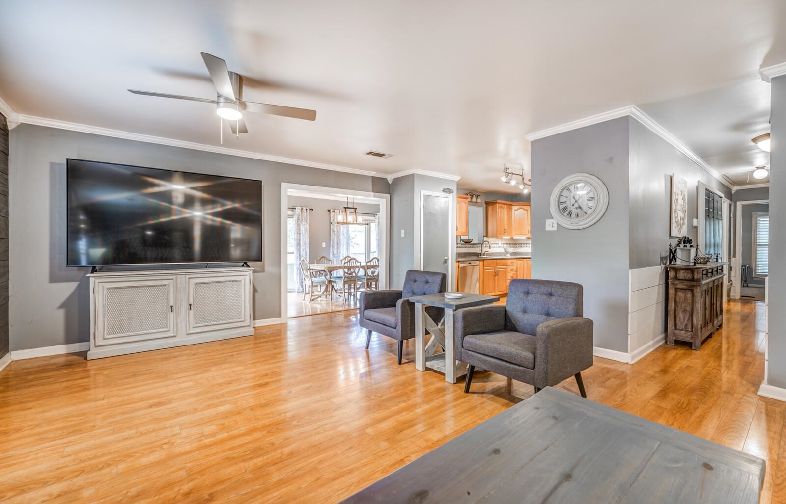 3089 Charles Bryan Road Bartlett, TN 38134 - Photo 6 of 28 a living room with furniture and a flat screen tv