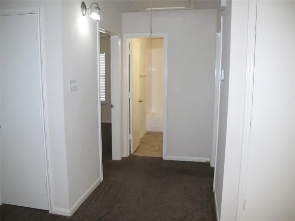 an empty room with an entryway