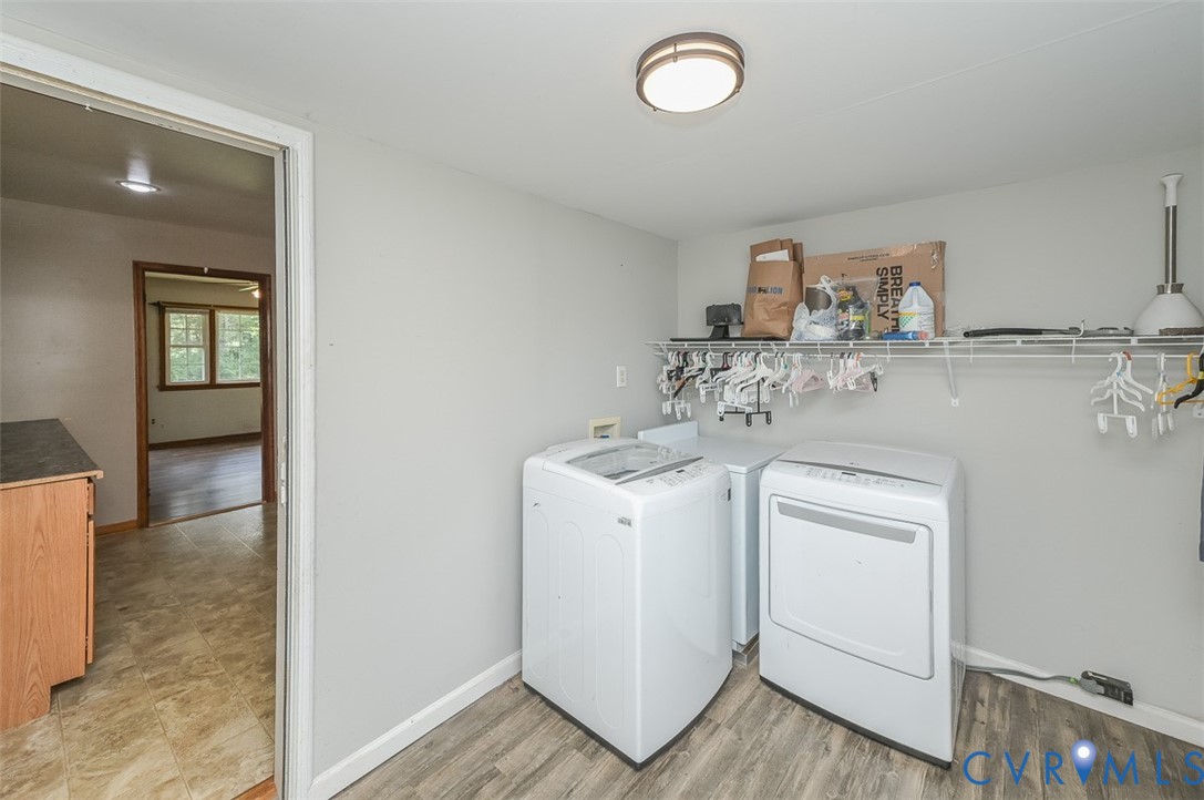 581 Smokey Road Aylett, VA 23009 - Photo 15 of 28 Dedicated utility space featuring wood-finish floo