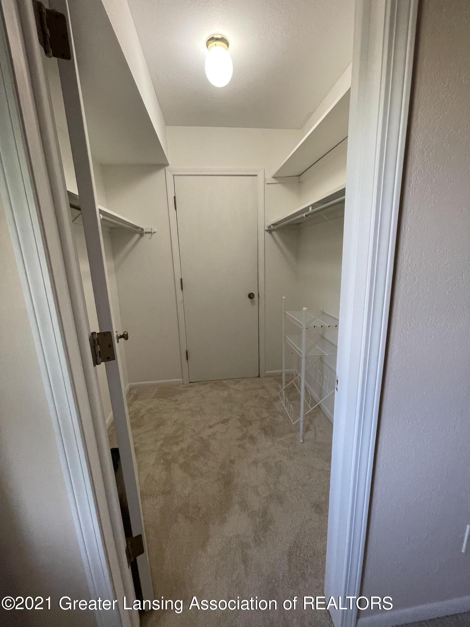 5402 Maple Ridge Road, Unit 6 Haslett, MI 48840 - Photo 13 of 21 Primary Bdrm closet
