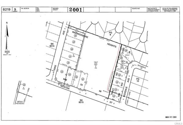 a picture of a room with a white wall and a picture of the side