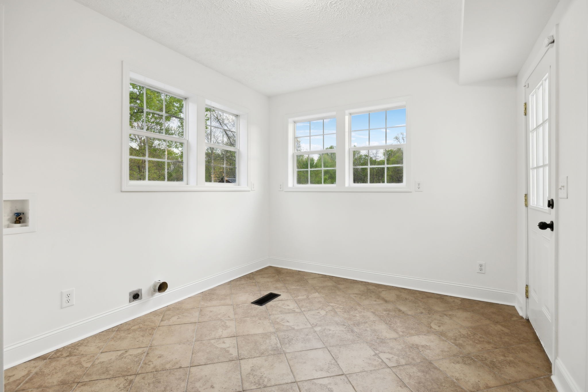1054 Coker Ford Road Portland, TN 37148 - Photo 30 of 72 a view of an empty room with a window