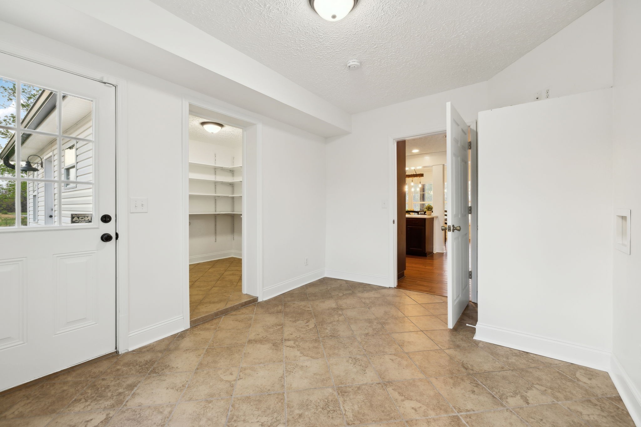 1054 Coker Ford Road Portland, TN 37148 - Photo 31 of 72 an empty room with closet and wooden floor