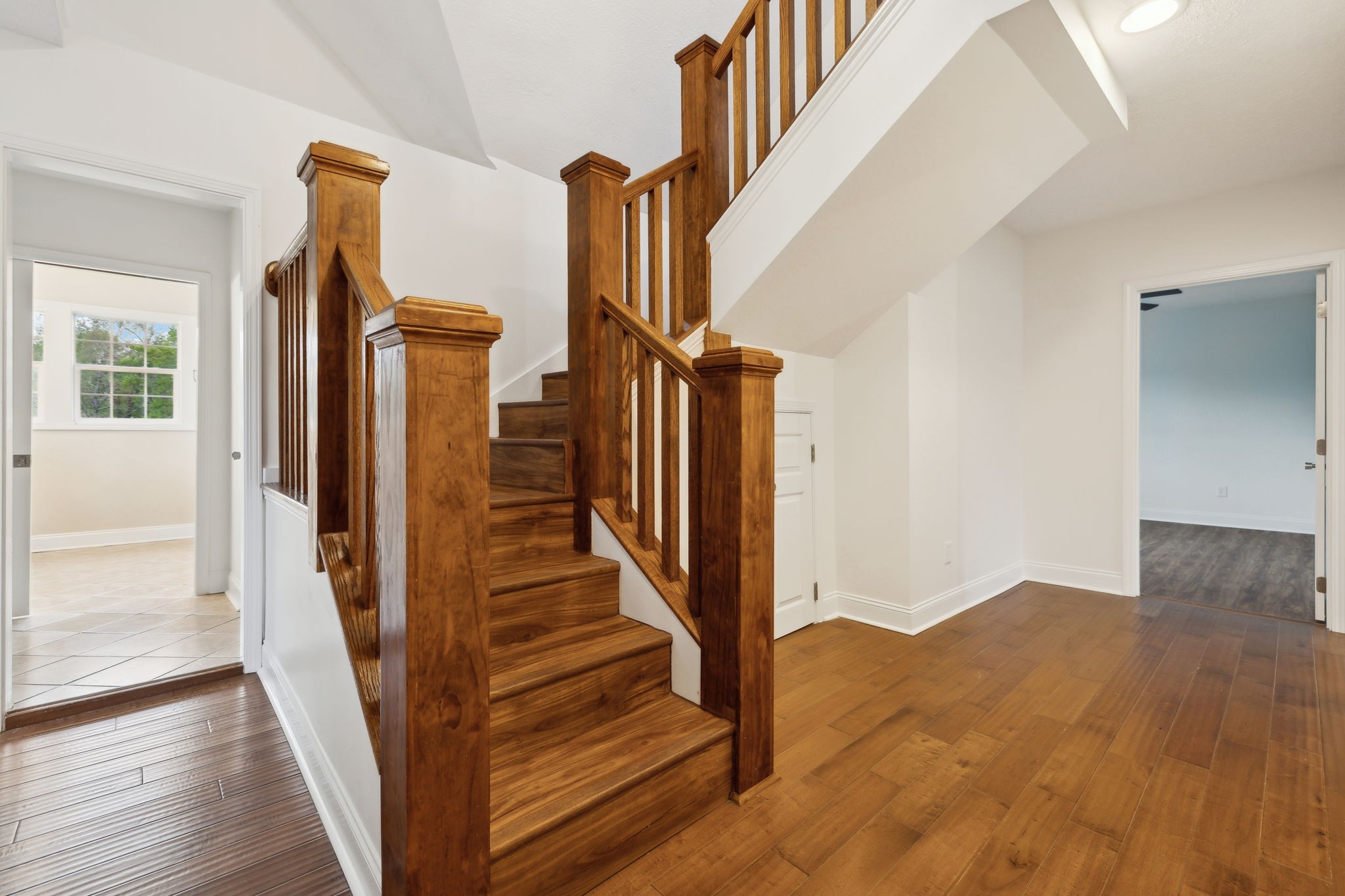 1054 Coker Ford Road Portland, TN 37148 - Photo 33 of 72 a view of hallway with wooden floor and stairs