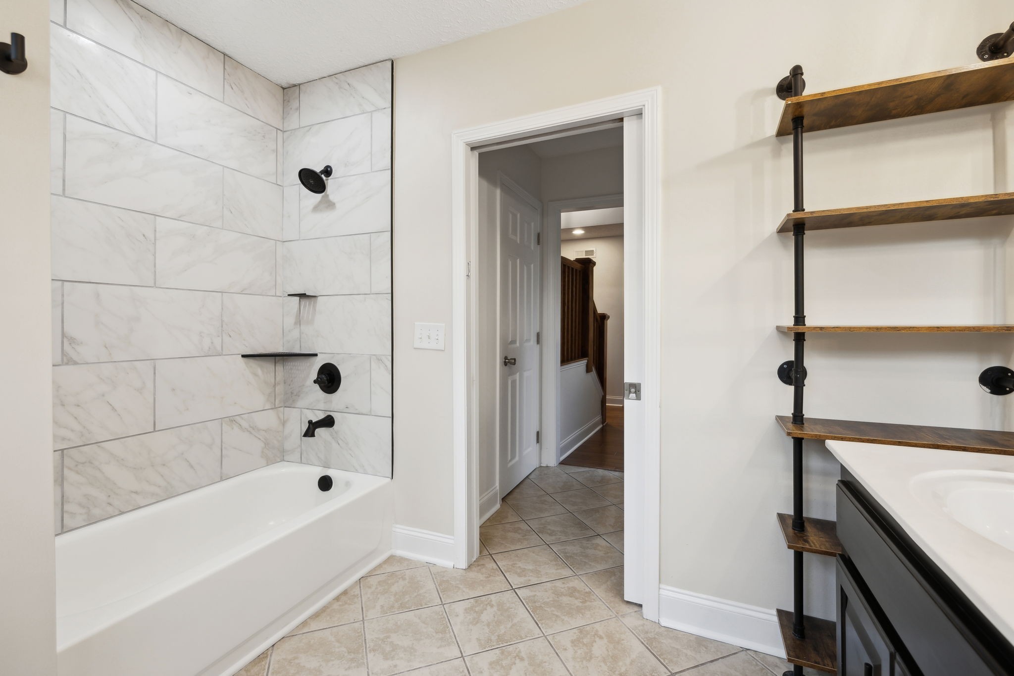 1054 Coker Ford Road Portland, TN 37148 - Photo 37 of 72 a bathroom with a bathtub and shower