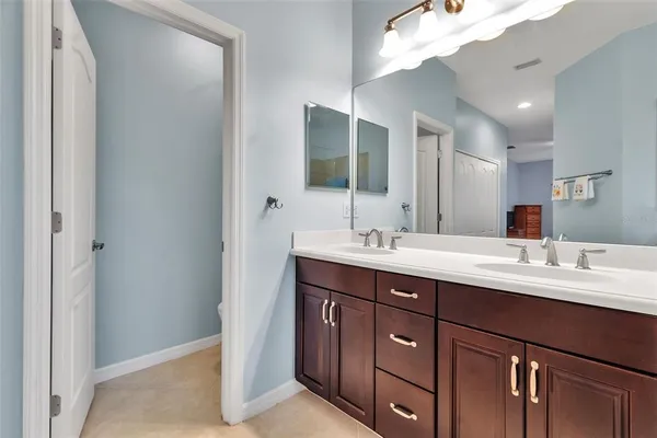 a bathroom with a sink a toilet and a bathtub