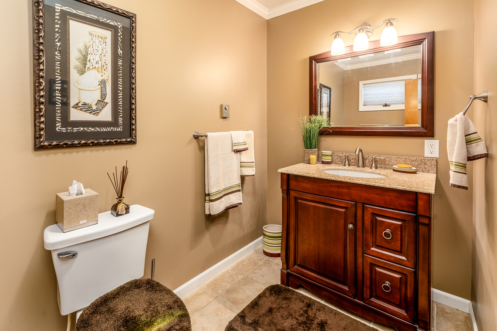 14798 Cherry Street Sesser, IL 62884 - Photo 12 of 37 a bathroom with a sink mirror and toilet