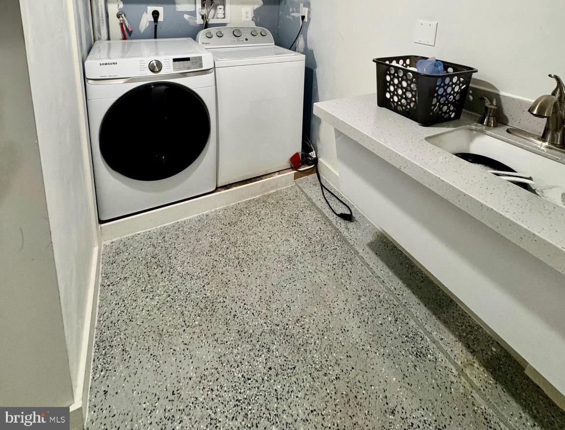 12704 Purcell Road Manassas, VA 20112 - Photo 25 of 47 a utility room with dryer and washer