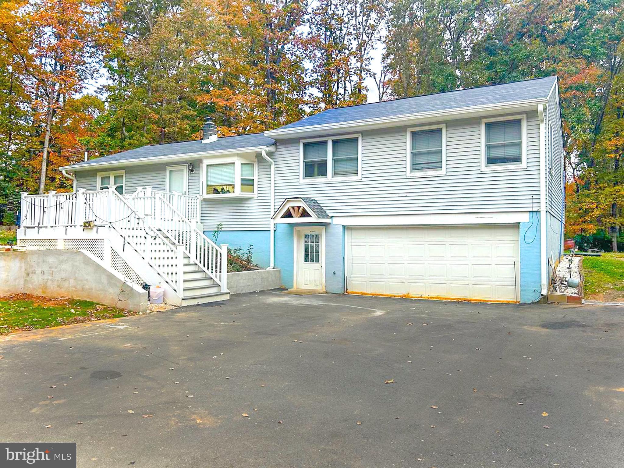 12704 Purcell Road Manassas, VA 20112 - Photo 3 of 47 a front view of a house with parking