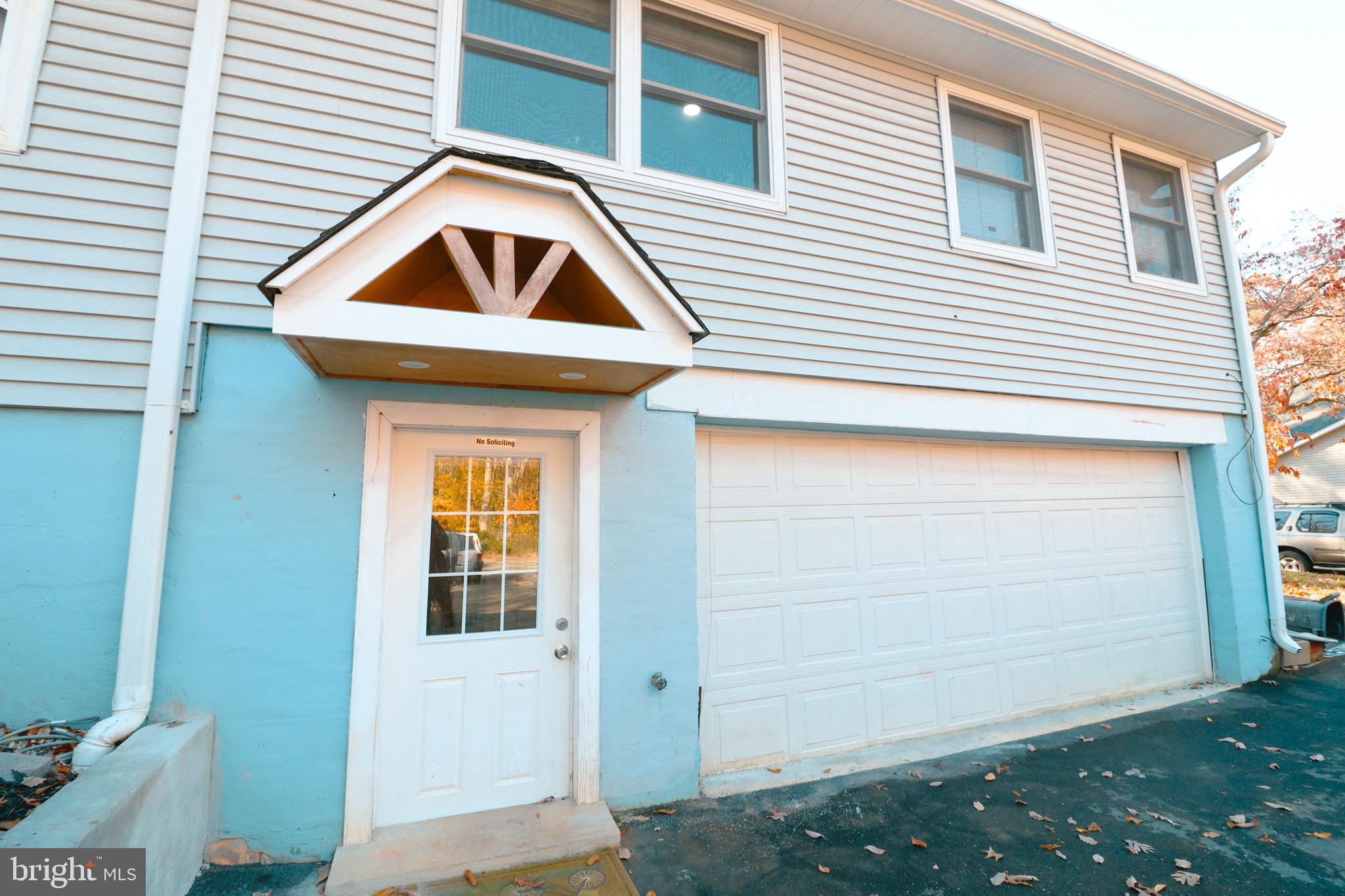 12704 Purcell Road Manassas, VA 20112 - Photo 37 of 47 a front view of a house with garage