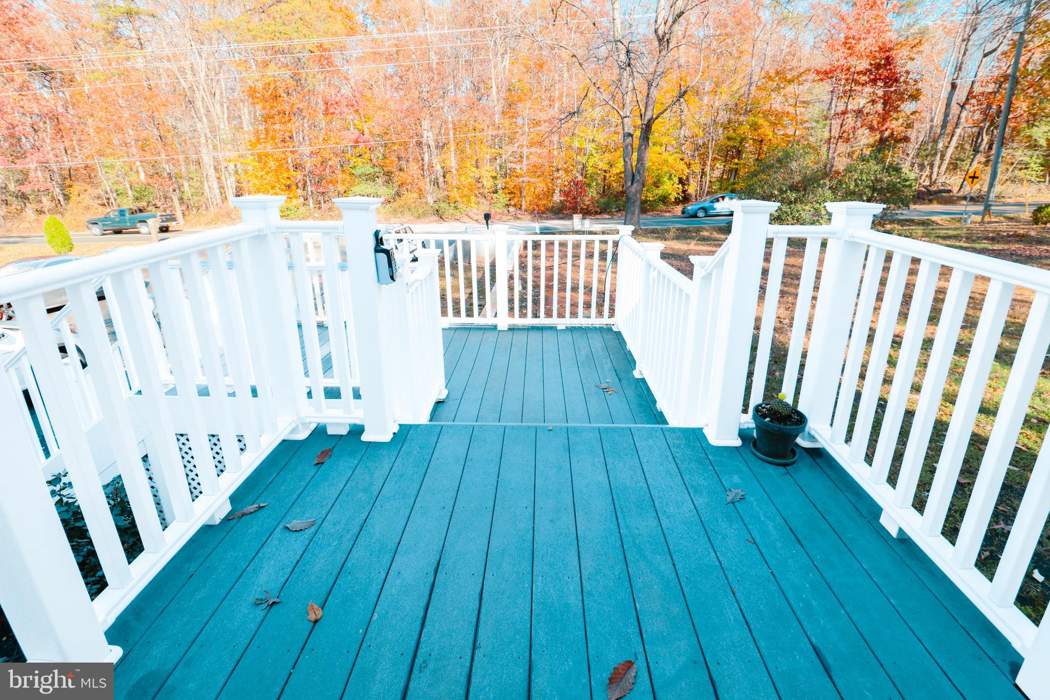 12704 Purcell Road Manassas, VA 20112 - Photo 39 of 47 a view of deck with wooden floor and fence